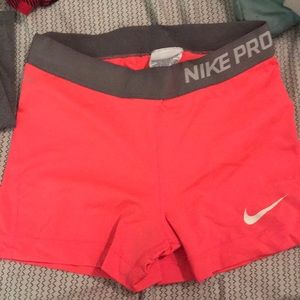 neon pink nike pros